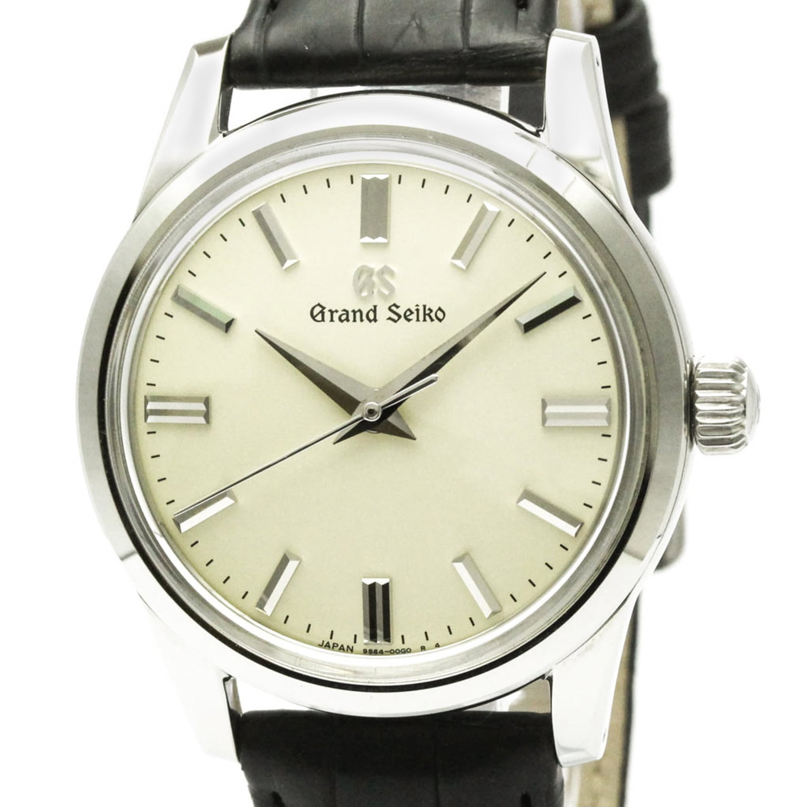 Wristwatch by Seiko: Wristwatch by Seiko Stainless steel case and leather band make for a sleek, formal look. This manual winding mechanical watch features a silver dial and measures 37mm in diameter. Comes with