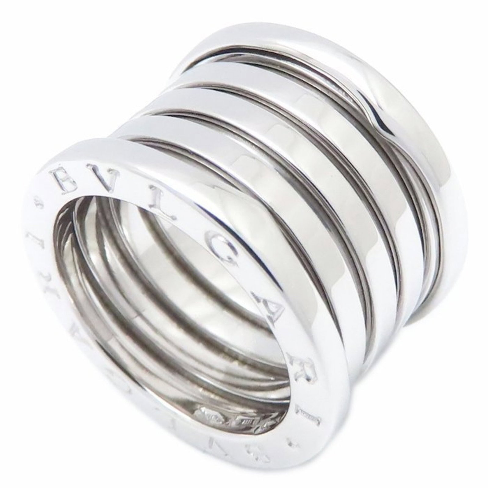 Bvlgari Band Ring White Gold (18K): Bvlgari Band Ring White Gold (18K) Bvlgari Band Ring White Gold (18K) features a sleek design with a signature from the artist, adding an extra layer of elegance to this stunning piece. Made from