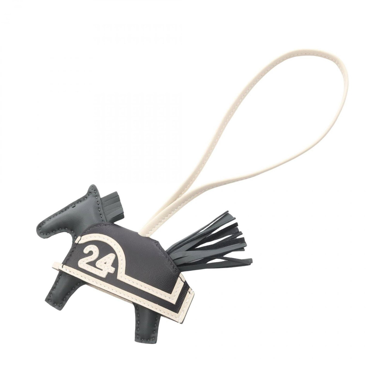 Swift Hermes Leather Agneau Milo Charm Handbag: Swift Hermes Leather Agneau Milo Charm Handbag Agneau Milo, Leather, and Swift leather come together in this sleek handbag charm from Hermes. The distinctive design features black, green, and white