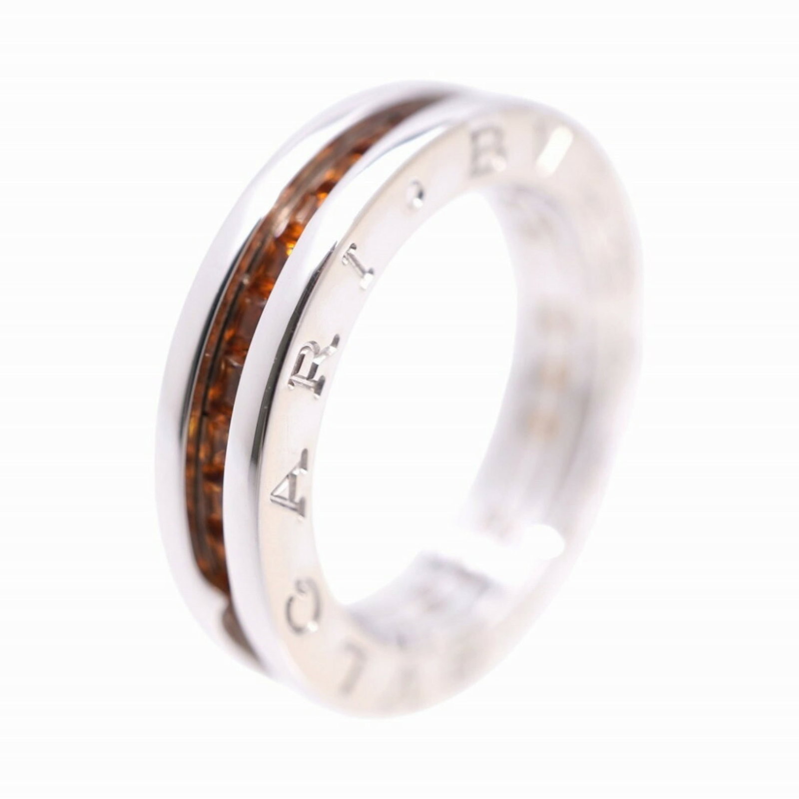 Bvlgari Band Ring White Gold (18K): Bvlgari Band Ring White Gold (18K) Bvlgari Band Ring White Gold (18K) features a striking citrine stone set in 18K white gold, showcasing the luxury brand's signature style. The band ring boasts a