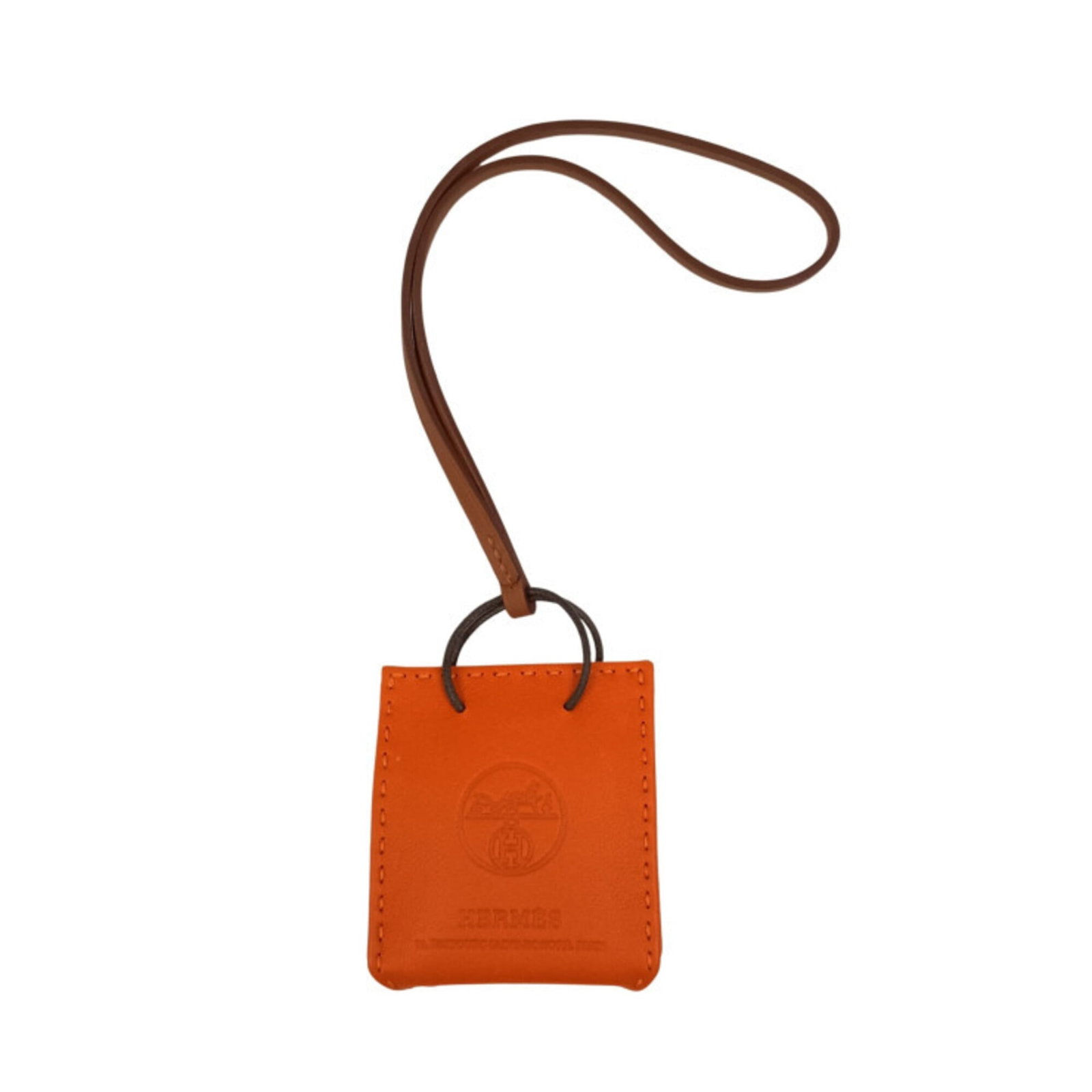 Hermes agneau handbag charm Milo: Hermes agneau handbag charm Milo Agneau Milo, the vibrant orange agneau handbag charm from Hermes, boasts a striking size and sleek design. Made from high-quality agneau material, this charm measures