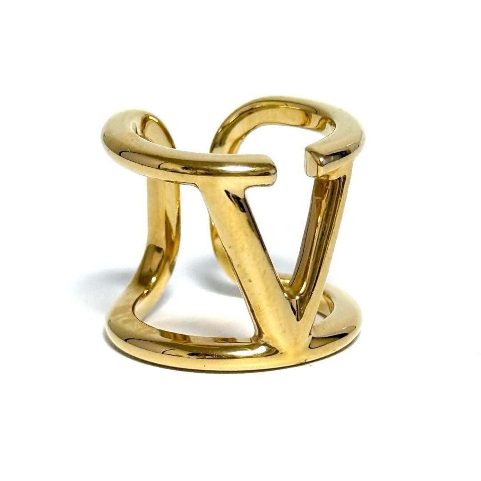Metal band ring Valentino: Metal band ring Valentino Valentino metal band ring in US size 5, featuring a sleek and modern design. This stylish accessory comes with a box and dust bag for added protection and presentation. The