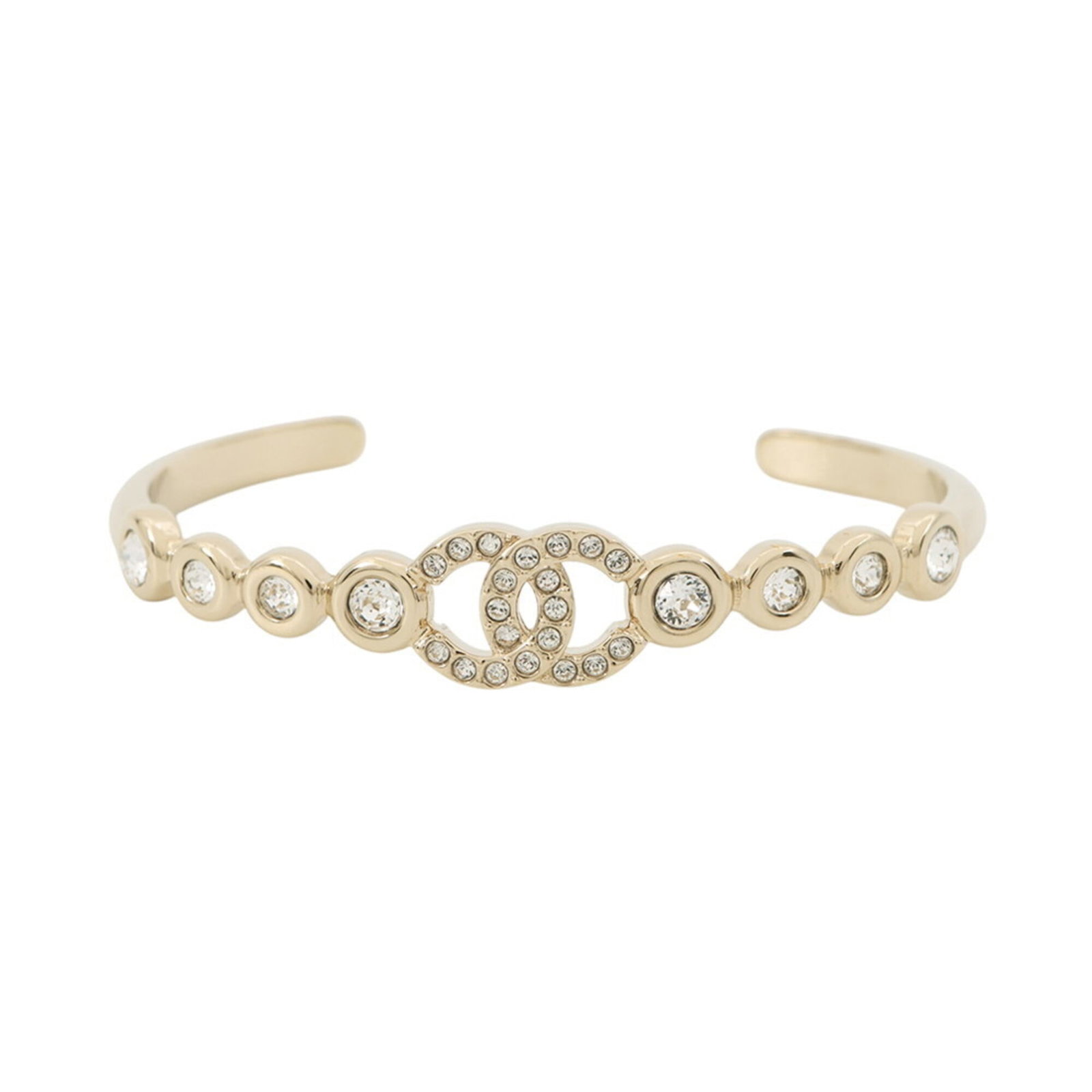 Chanel Bangle Gold Plating: Chanel Bangle Gold Plating Champagne gold bangle with a sleek, modern design. Made from gold plating, this stylish accessory measures 17cm in length and features a classic Chanel aesthetic. Item Speci