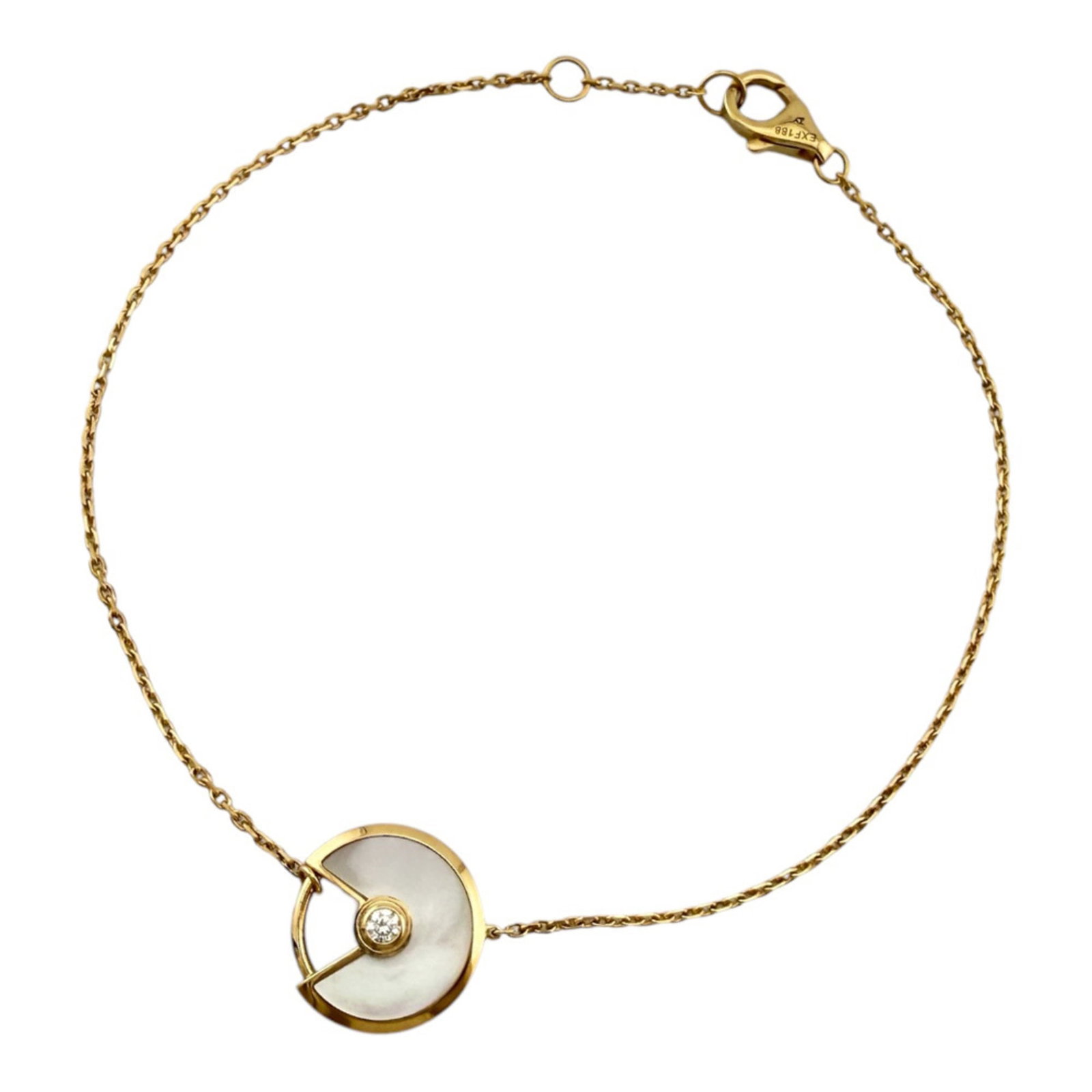 Charm Cartier Yellow Gold Bracelet: Charm Cartier Yellow Gold Bracelet Yellow gold (18K) Charm bracelet from Cartier, featuring a diamond stone and measuring 18cm in length. This elegant piece boasts the iconic charm style that has