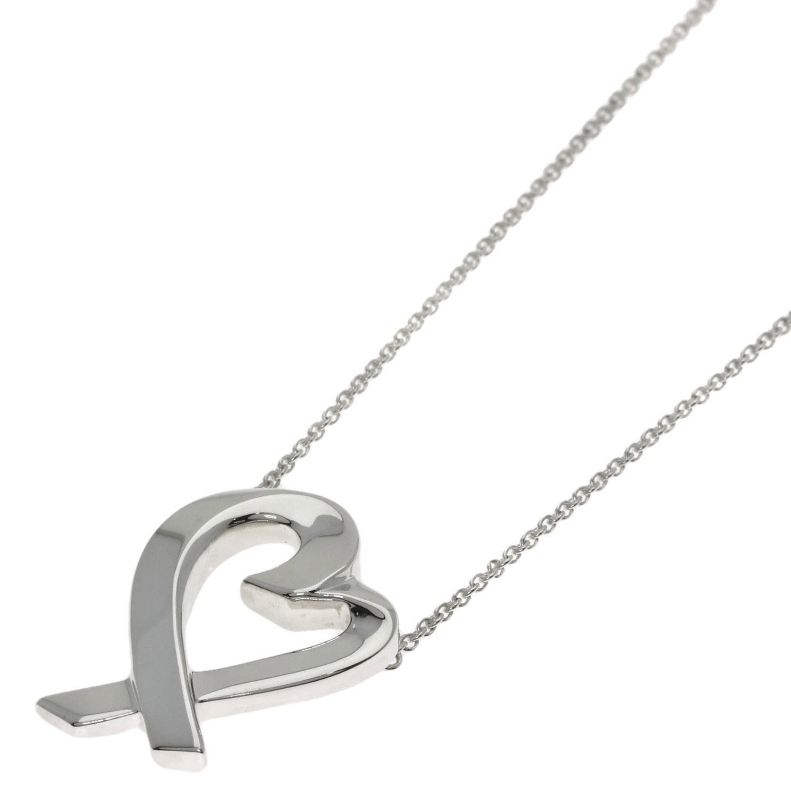 Women's necklace loving heart silver Tiffany.: Women's necklace loving heart silver Tiffany. Silver Tiffany Loving Heart Necklace boasts a striking design with a pendant featuring a loving heart shape, measuring 20.9mm x 15.2mm. The necklace's