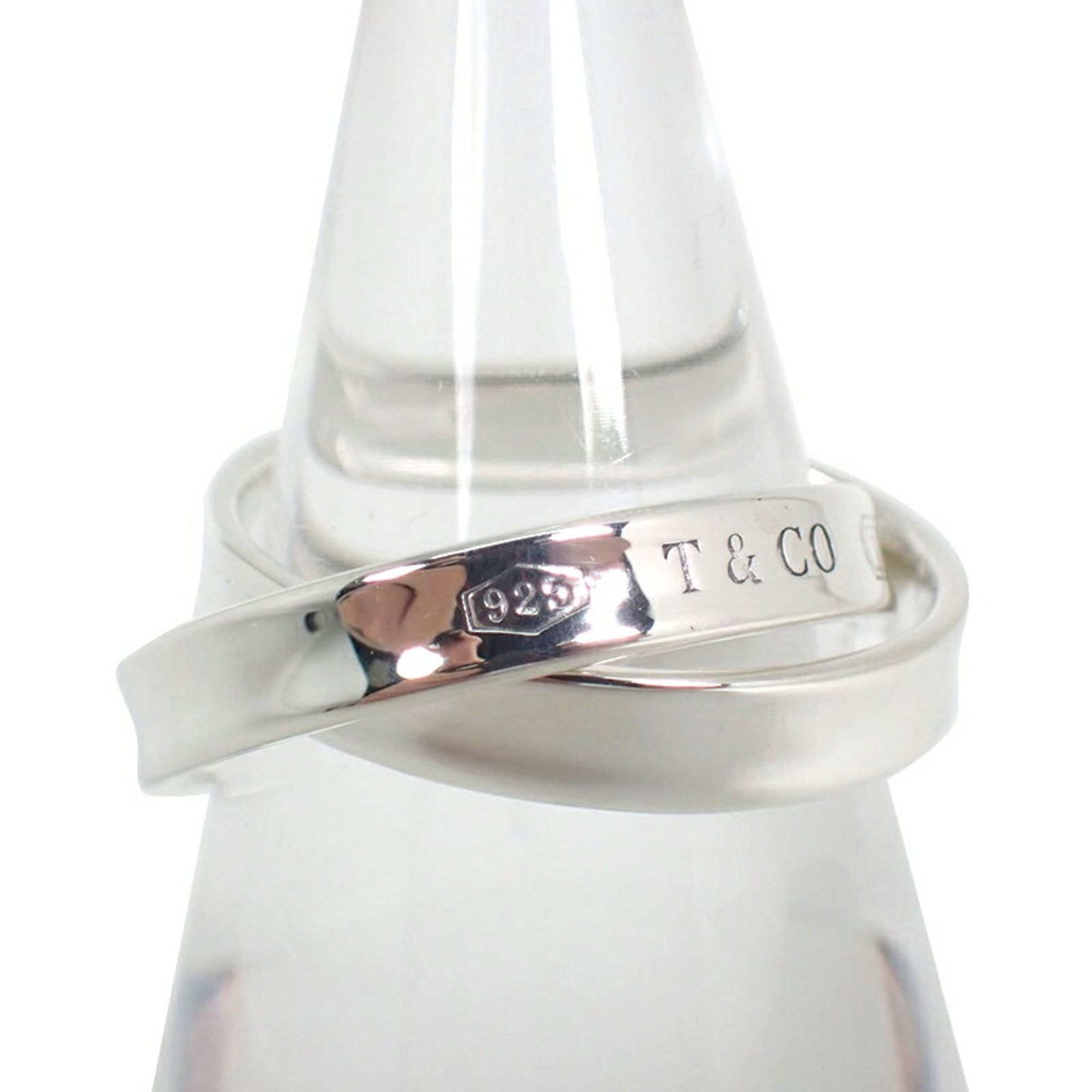 Sterling Silver Tiffany Band Ring 925: Sterling Silver Tiffany Band Ring 925 Sterling silver Tiffany band ring 925, featuring a sleek and modern design. Made from high-quality sterling silver material (925), this elegant ring boasts a clas
