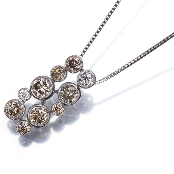 Kashikey Necklace Brown &Cleardiamond 1.06Ct/ 0.12Ct Bezel Pt 900/ Pt 850: Kashikey Necklace Brown &Cleardiamond 1.06Ct/ 0.12Ct Bezel Pt 900/ Pt 850 Kashikey's stunning platinum necklace boasts a striking combination of brown and clear diamonds, with the main stone featuring