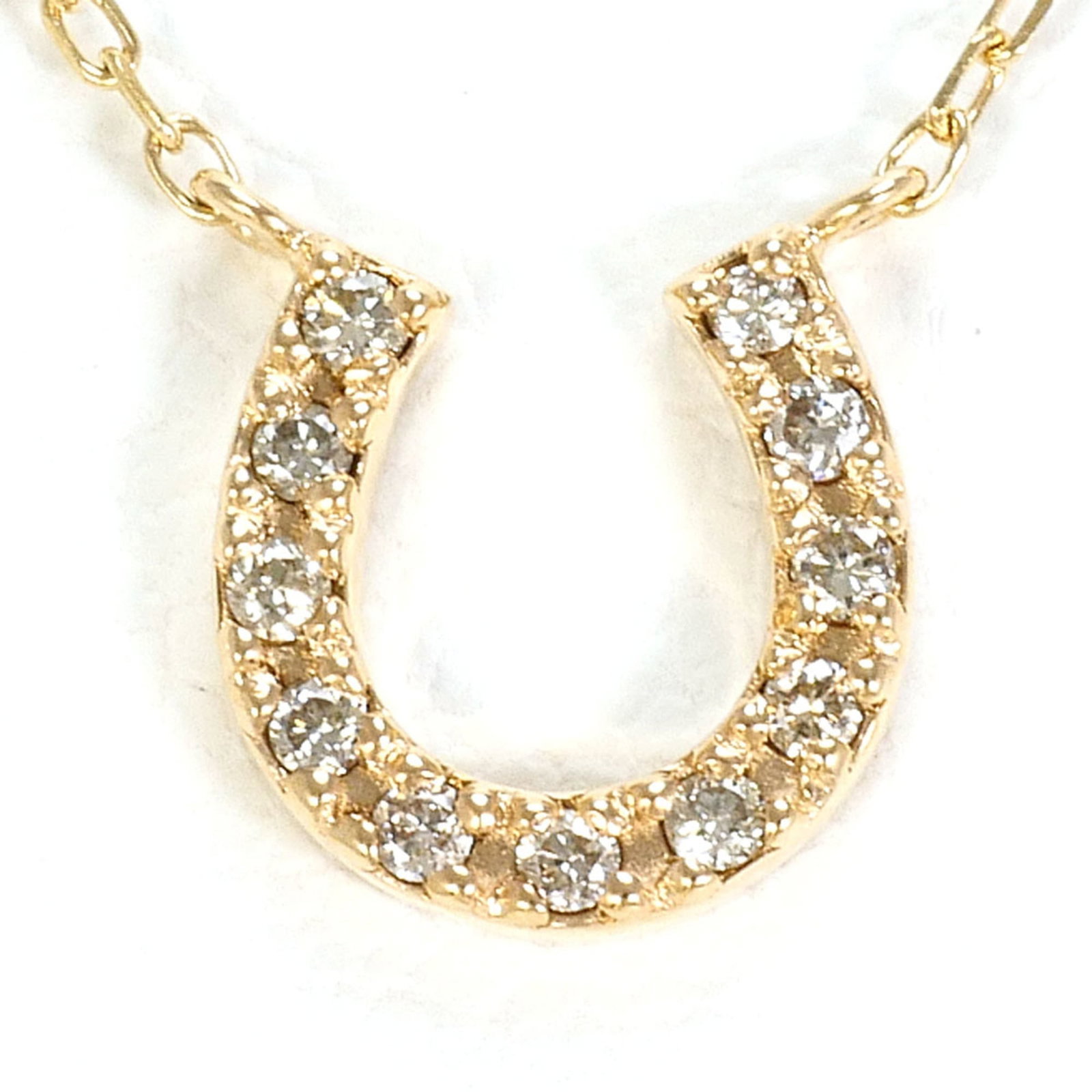 K10 10K Yg Yellow Gold Necklace With Diamond (No Carat Marking) Total Weight 1.0G 40Cm Like New: K10 10K Yg Yellow Gold Necklace With Diamond (No Carat Marking) Total Weight 1.0G 40Cm Like New Yellow gold necklace with diamond pendant, featuring a total weight of 1.0g and a 40cm circumference. Th
