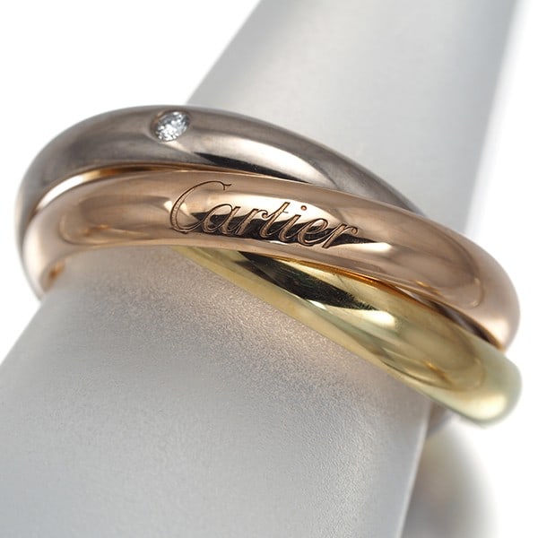 Cartier Ring Diamond Trinity 3Color Classic 5P Eu51 18K Yg/ Wg/ Rg: Cartier Ring Diamond Trinity 3Color Classic 5P Eu51 18K Yg/ Wg/ Rg Multi-tone gold Cartier ring features a natural diamond, part of the Trinity collection. The 18k yellow, white, and rose gold