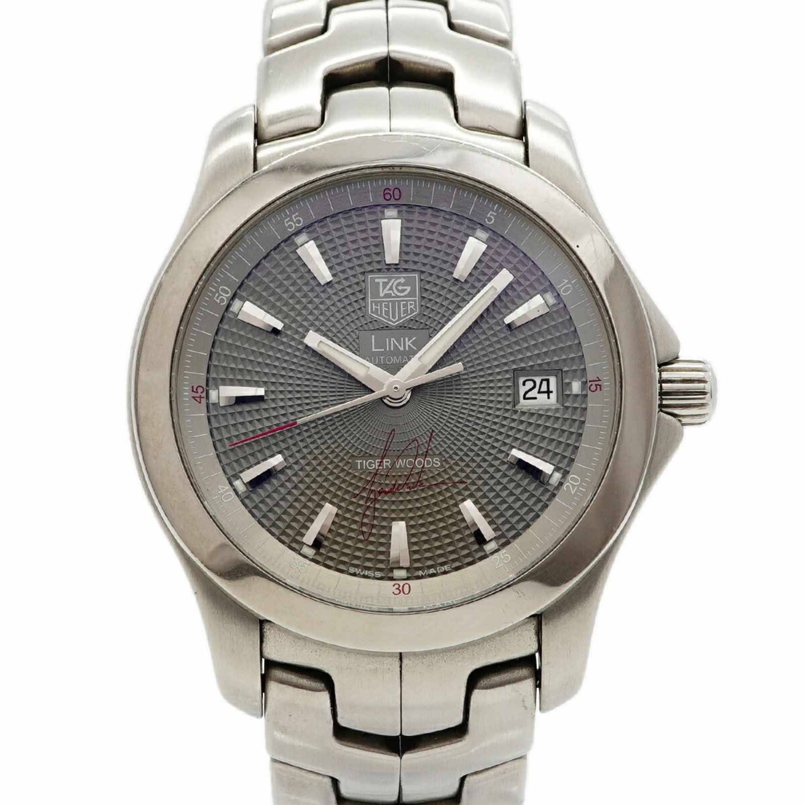 Wristwatch From Tag: Wristwatch From Tag Stainless steel band and gray dial make for a sleek, versatile timepiece. This self-winding automatic wristwatch from Tag Heuer boasts a compact 38.5mm case diameter, perfect for