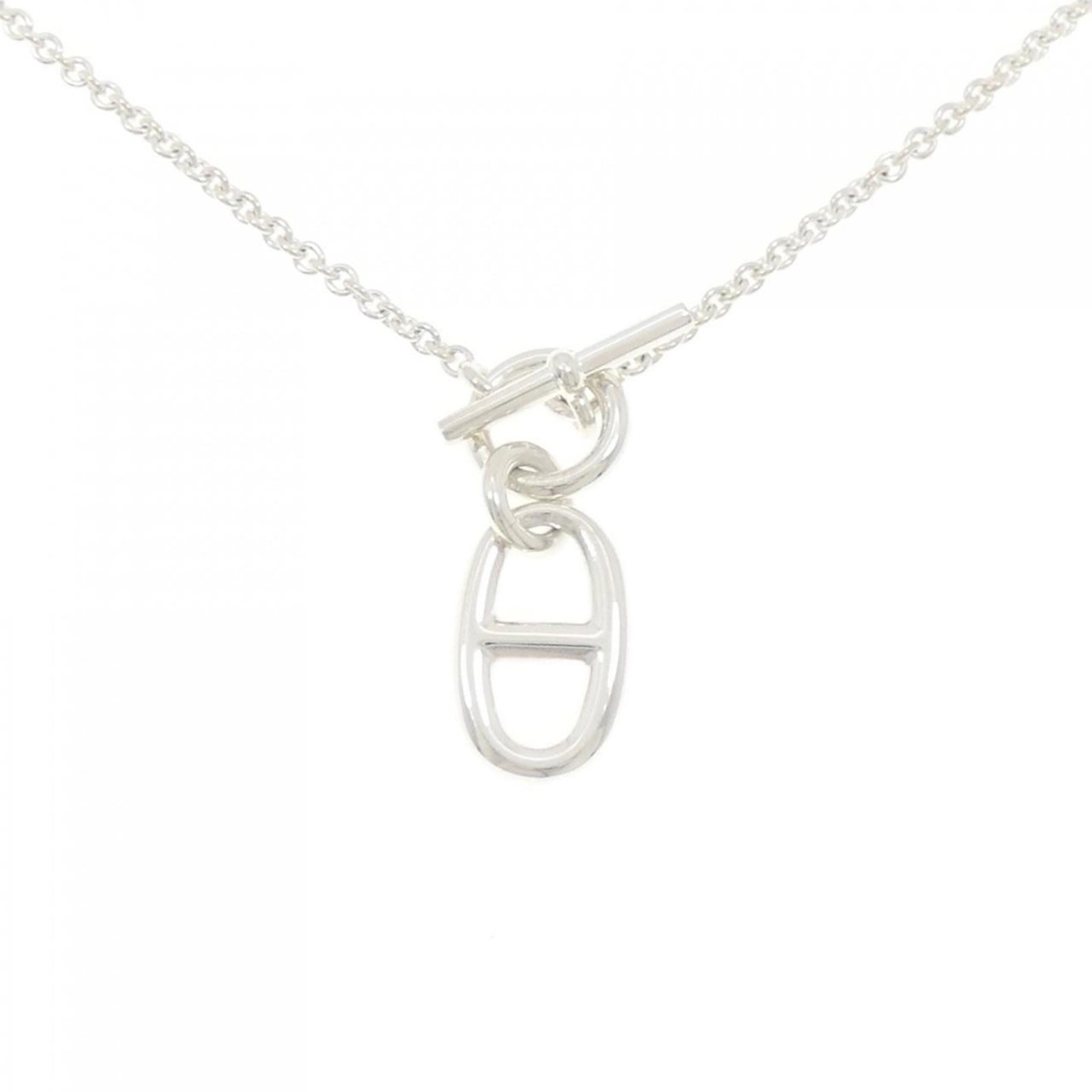 Chaine d'ancre Hermes Necklace: Chaine d'ancre Hermes Necklace The Chaine d'ancre Hermes Necklace features a silver pendant with a signature, set in a sterling silver chain. Weighing 9.6g, the necklace measures 41 cm in circumferenc