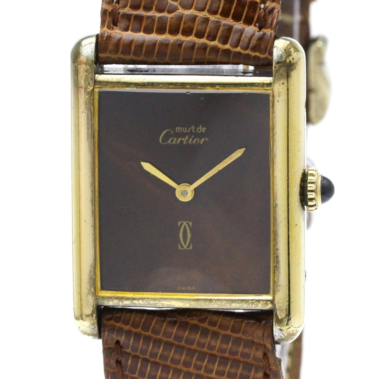 Wristwatch By Cartier: Wristwatch By Cartier Gold plated Cartier Must Tank wristwatch with brown leather band and manual winding mechanical movement, featuring a classic dress/formal style. Weighing in at just 30g, this
