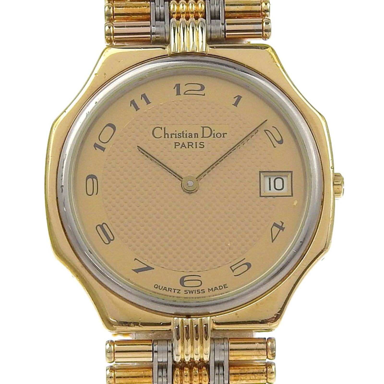 Christian Dior Wristwatch: Christian Dior Wristwatch Gold plated Christian Dior wristwatch with an analog display, featuring a 37mm gold plated case and matching gold plated band. This quartz movement watch boasts a classic