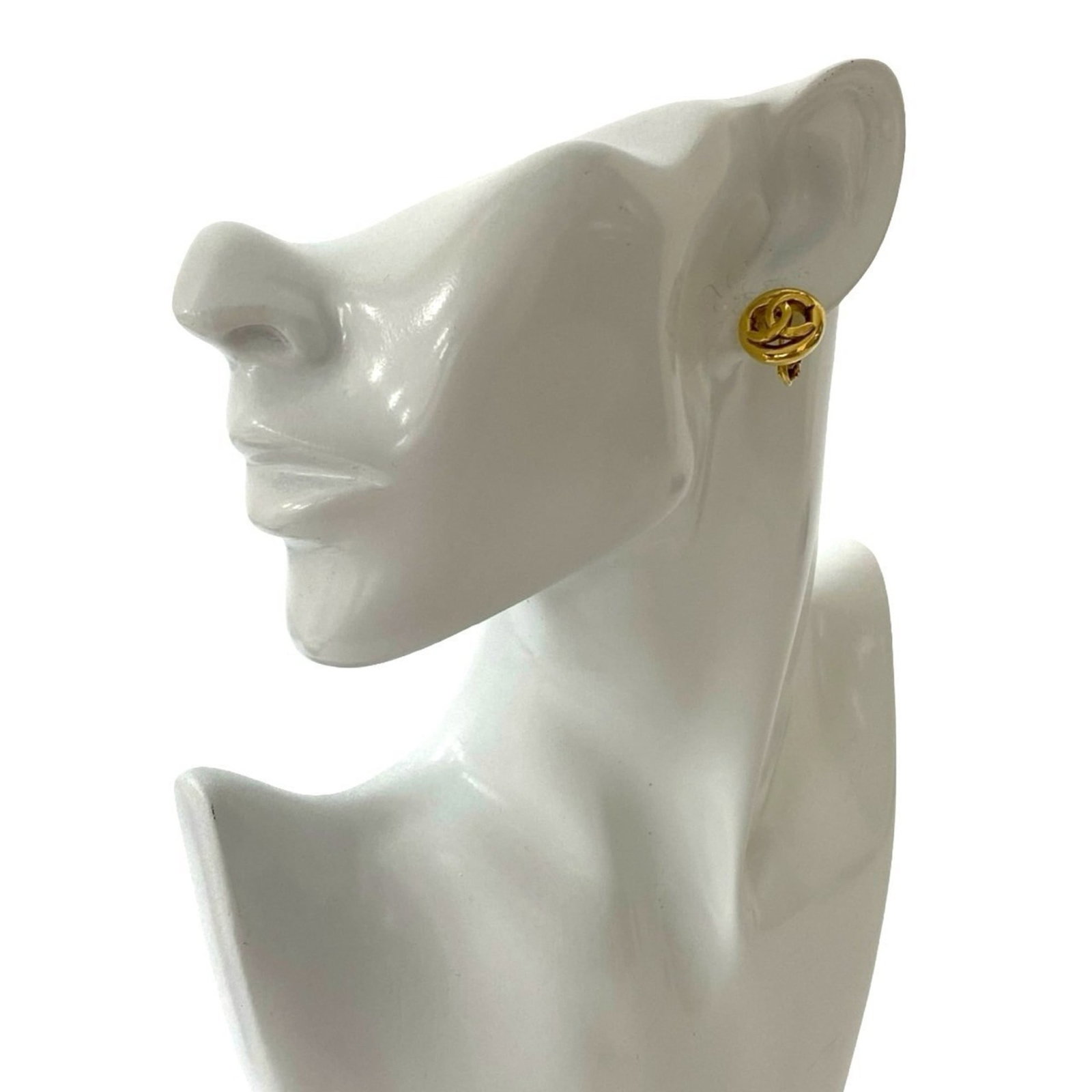 Chanel Clip Earrings Gold Plating: Chanel Clip Earrings Gold Plating Gold plating adds a touch of luxury to these sleek clip earrings from Chanel, featuring a precise gold plating finish. With their compact size and minimalist design, 