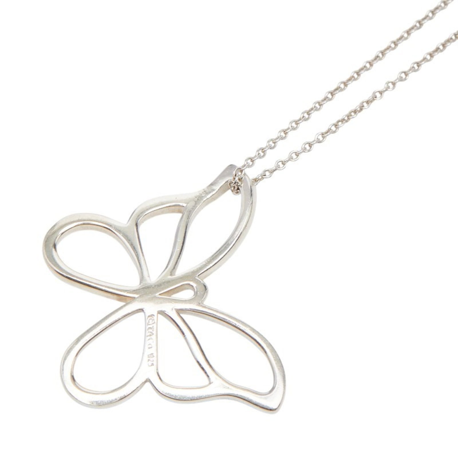Tiffany Butterfly Necklace In 925 Sterling Silver For Women. Tiffany & Co.: Tiffany Butterfly Necklace In 925 Sterling Silver For Women. Tiffany & Co. Tiffany & Co.'s iconic butterfly necklace shines in sterling silver, its delicate design measuring 23.1mm x 27.6mm. The 41.5 