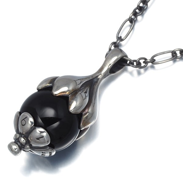 Georg Jensen Necklace Onyx Heritage 1991 925 Sterling Silver: Georg Jensen Necklace Onyx Heritage 1991 925 Sterling Silver Sterling silver necklace featuring a natural onyx pendant, part of Georg Jensen's Heritage collection from 1991. The necklace boasts a slee