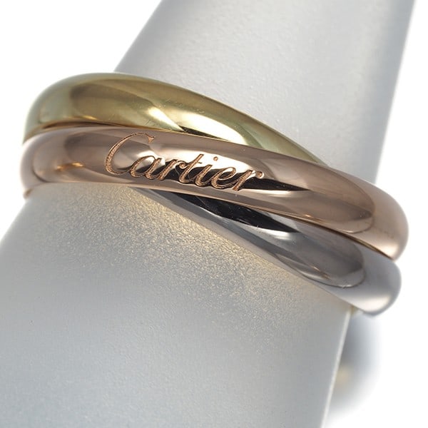 Cartier Ring Trinity 3Color Sm Eu51 18K 750 Yellow White Rose Gold: Cartier Ring Trinity 3Color Sm Eu51 18K 750 Yellow White Rose Gold Cartier's iconic Trinity ring boasts a unique, multi-toned design featuring 18k yellow, white, and rose gold. This elegant piece