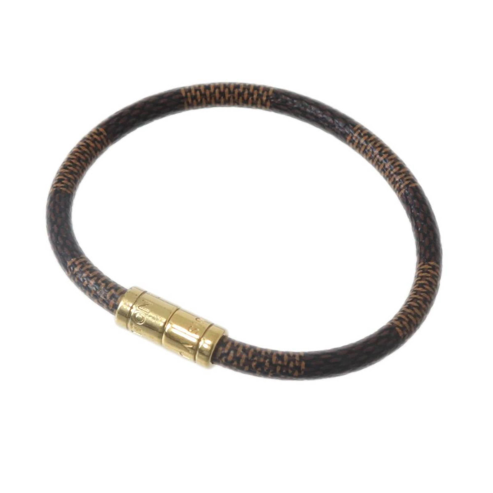 Louis Vuitton Charm Bracelet: Louis Vuitton Charm Bracelet Ebene Louis Vuitton Charm Bracelet, crafted in France, features a classic charm bracelet design with no additional accessories. Measuring 19cm in length, this elegant