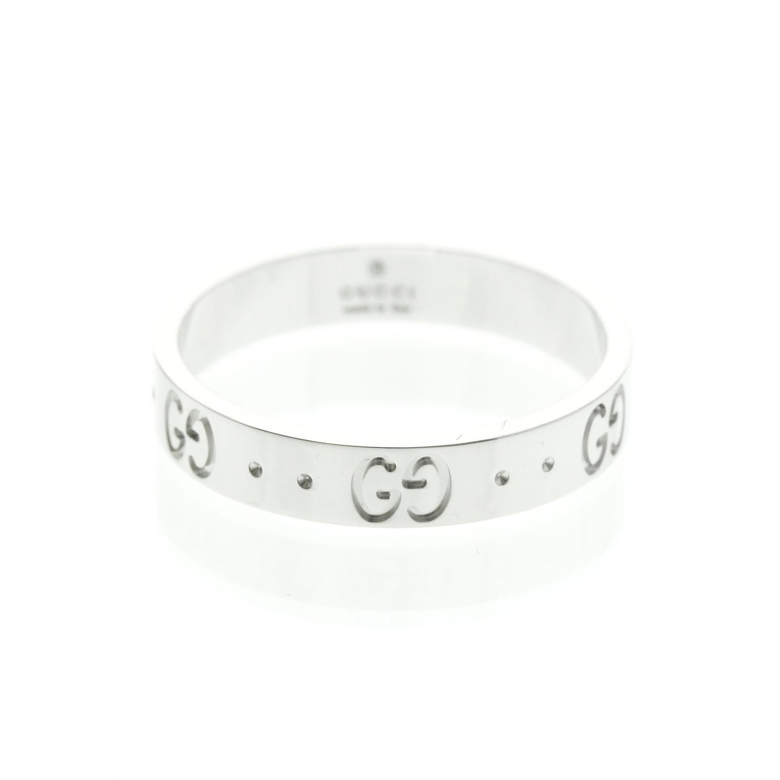 White Gold Gucci Band Ring: White Gold Gucci Band Ring White gold band ring from Gucci's iconic line, crafted with 18K metal and featuring a sleek 4mm width. This stylish piece boasts a silver finish without any added stones, ma