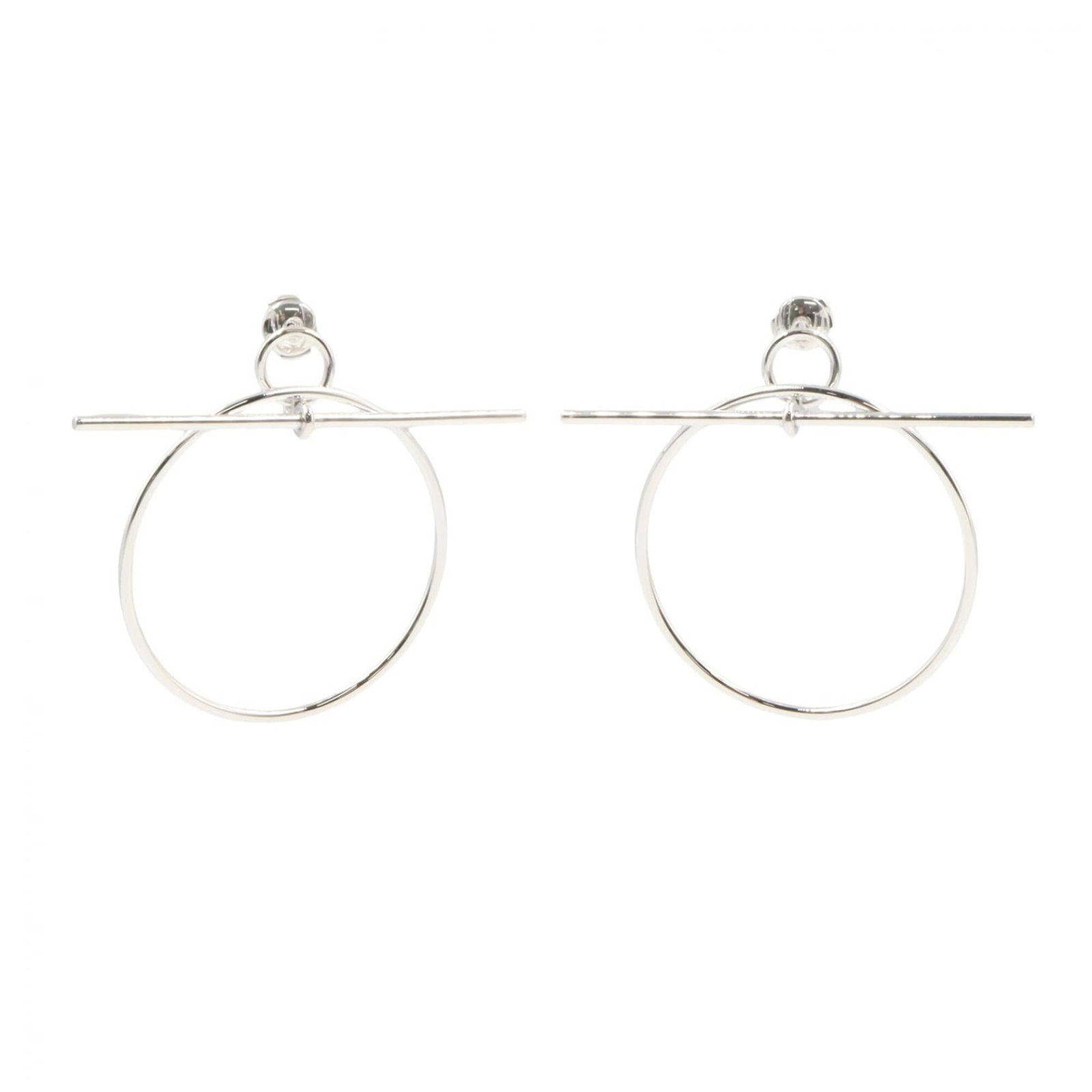 Hermes Stud Silver Earrings 925: Hermes Stud Silver Earrings 925 Stud earrings from the renowned French fashion house Hermes, crafted in sterling silver (925). The sleek design features a classic stud style with a subtle sheen. Measu