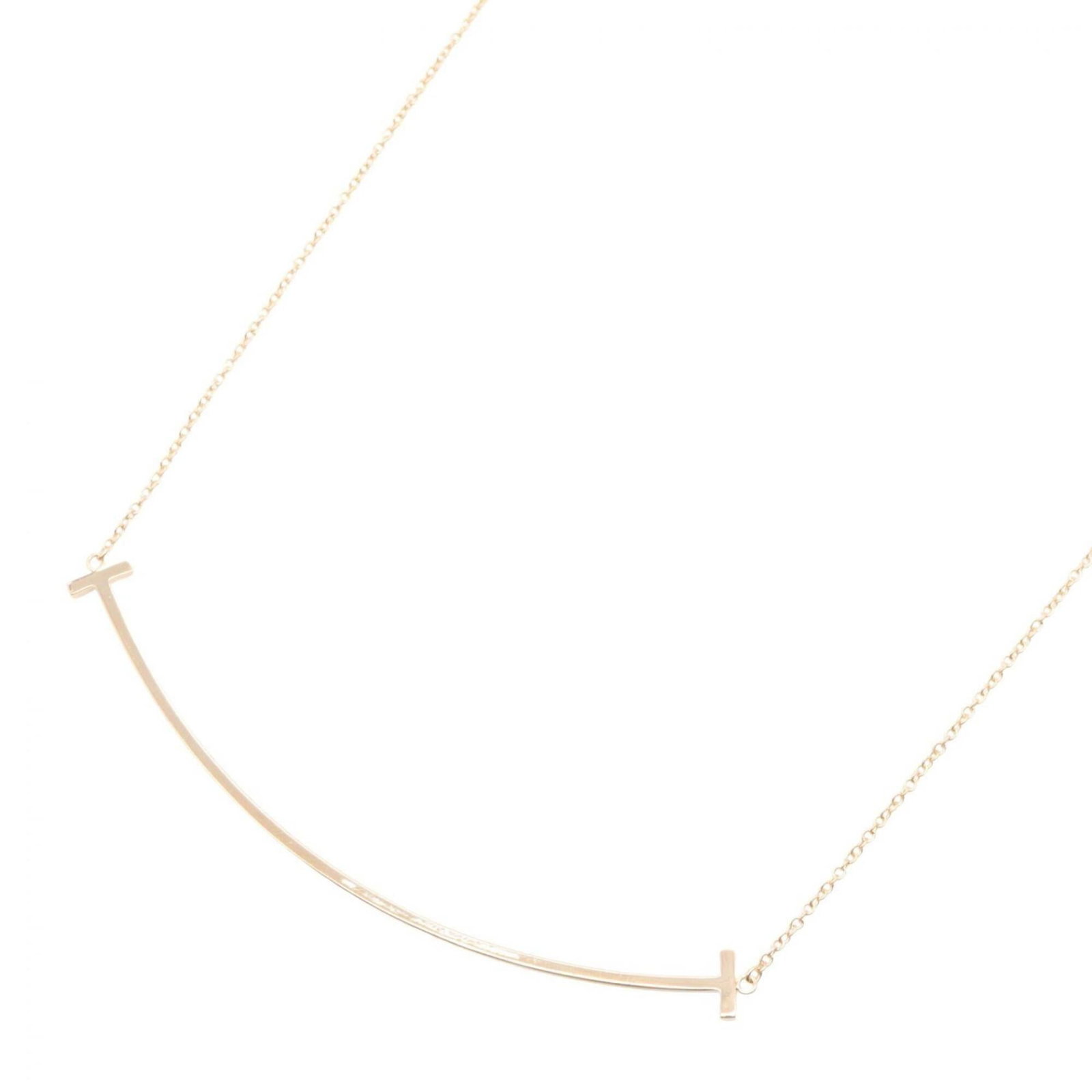 Tiffany & Co. T Smile Large Necklace 18K Pink Gold (Pg) Women'S Gold-Tone Necklace.: Tiffany & Co. T Smile Large Necklace 18K Pink Gold (Pg) Women'S Gold-Tone Necklace. Tiffany & Co. T Smile Large Necklace in 18K Pink Gold features a striking design with a 5mm x 67mm pendant, perfect 