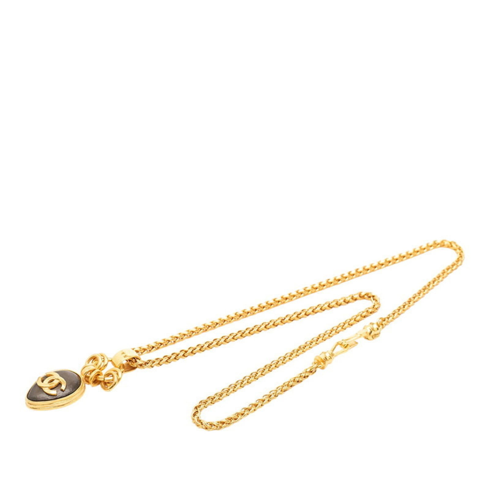Women's gold plated necklace Chanel vintage brown and Coco mark Chanel.: Women's gold plated necklace Chanel vintage brown and Coco mark Chanel. Women's gold plated necklace with a vintage brown and Coco mark Chanel design, featuring a 35.6mm x 25.9mm pendant. The