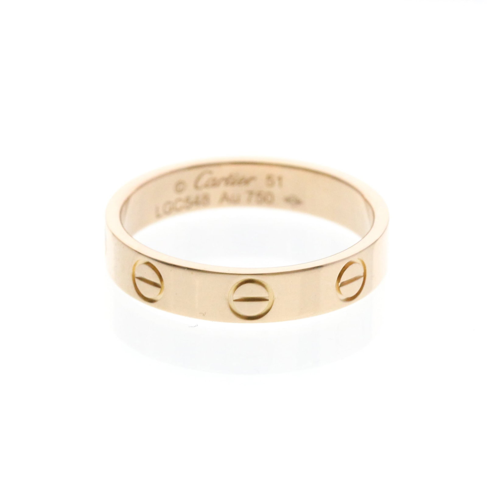 Pink Gold Ring Band Cartier: Pink Gold Ring Band Cartier Pink gold band ring from Cartier, featuring 18K pink gold material and measuring 3.7mm in width, weighing 3.2g. This stylish accessory boasts a classic design with no stone