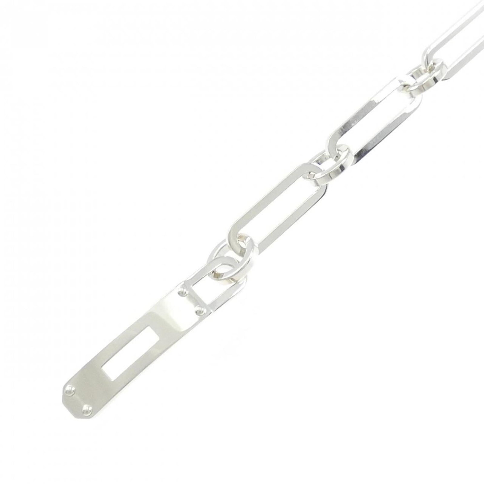 Charm Bracelet Silver 925 by Hermes: Charm Bracelet Silver 925 by Hermes Silver 925 Charm Bracelet by Hermes features a sleek design with a total length of 21cm. Made from high-quality silver, this charm bracelet boasts a width of 7.4mm
