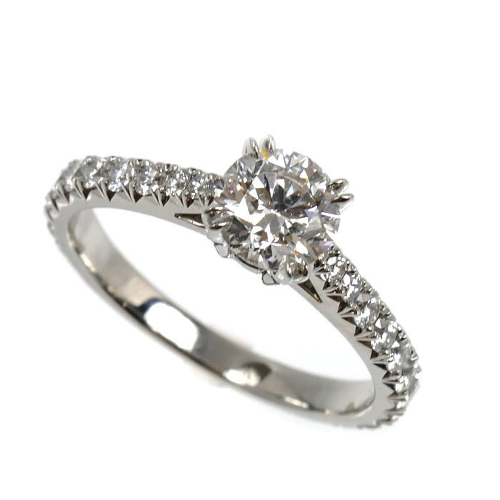 Harry Winston platinum ring band 950: Harry Winston platinum ring band 950 Platinum band ring from Harry Winston, featuring a diamond stone and made from high-quality platinum. This elegant ring boasts the signature of its creator,