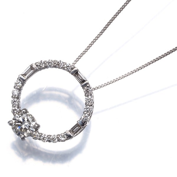 Diamond 0.24Ct/ 0.18Ct Circle Necklace 950 850 Platinum: Diamond 0.24Ct/ 0.18Ct Circle Necklace 950 850 Platinum The 0.24ct diamond circle pendant, set in platinum, adds a touch of elegance to any outfit with its natural beauty and understated charm. This