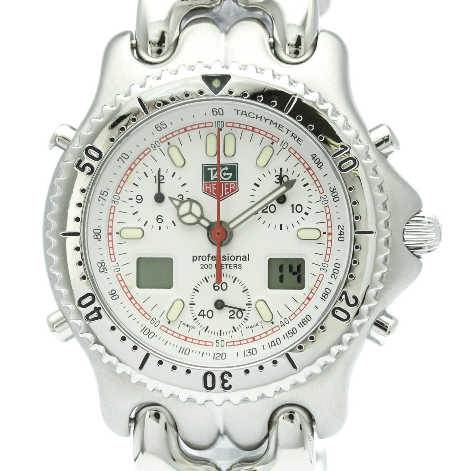 Wristwatch From Tag: Wristwatch From Tag Stainless steel case and band, the Tag Heuer Sel watch boasts a sleek silver dial. With quartz movement and chronograph function, this sporty timepiece offers precision and style. 