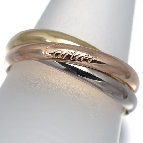 Cartier Ring Trinity 3Color Sm Eu55 18K 750 Yellow White Rose Gold: Cartier Ring Trinity 3Color Sm Eu55 18K 750 Yellow White Rose Gold Cartier's Trinity ring boasts a striking multi-tone gold design, featuring 18k yellow, white, and rose gold. This elegant piece