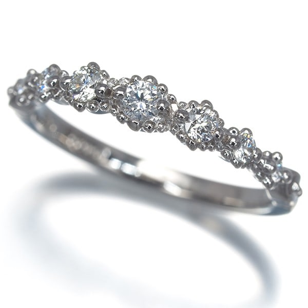 Diamond Ring 0.18Ct Milgrain Us4.5 Platinum Star Jewelry: Diamond Ring 0.18Ct Milgrain Us4.5 Platinum Star Jewelry The 0.18ct Diamond Ring in 950 Platinum boasts a striking milgrain design, adding an intricate touch to its elegant star-shaped jewelry.