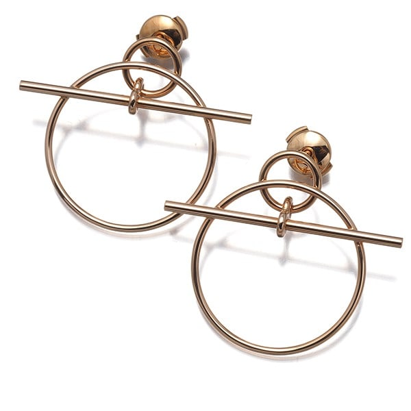 Hermes Earrings Echappee Pm 18K 750 Rose Gold: Hermes Earrings Echappee Pm 18K 750 Rose Gold Drop earrings featuring 18k rose gold, measuring 31.0 x 36.5mm in design size, with no stone present. The Echappee collection showcases a stylish drop/dan
