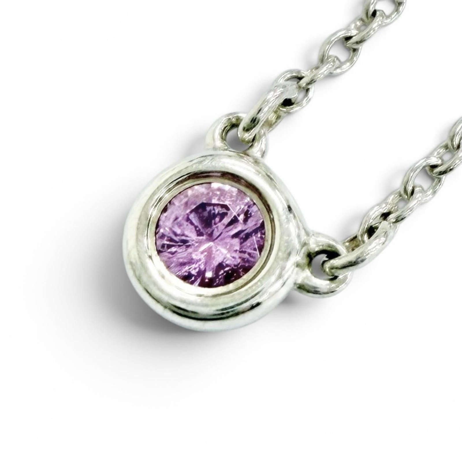 Tiffany&Co. Tiffany By The Yard 925 Pink Sapphire Pendant Necklace Silver Made In Spain Weight: Tiffany&Co. Tiffany By The Yard 925 Pink Sapphire Pendant Necklace Silver Made In Spain Weight Tiffany&Co.'s Tiffany By The Yard 925 Pink Sapphire Pendant Necklace is crafted from high-quality silver,