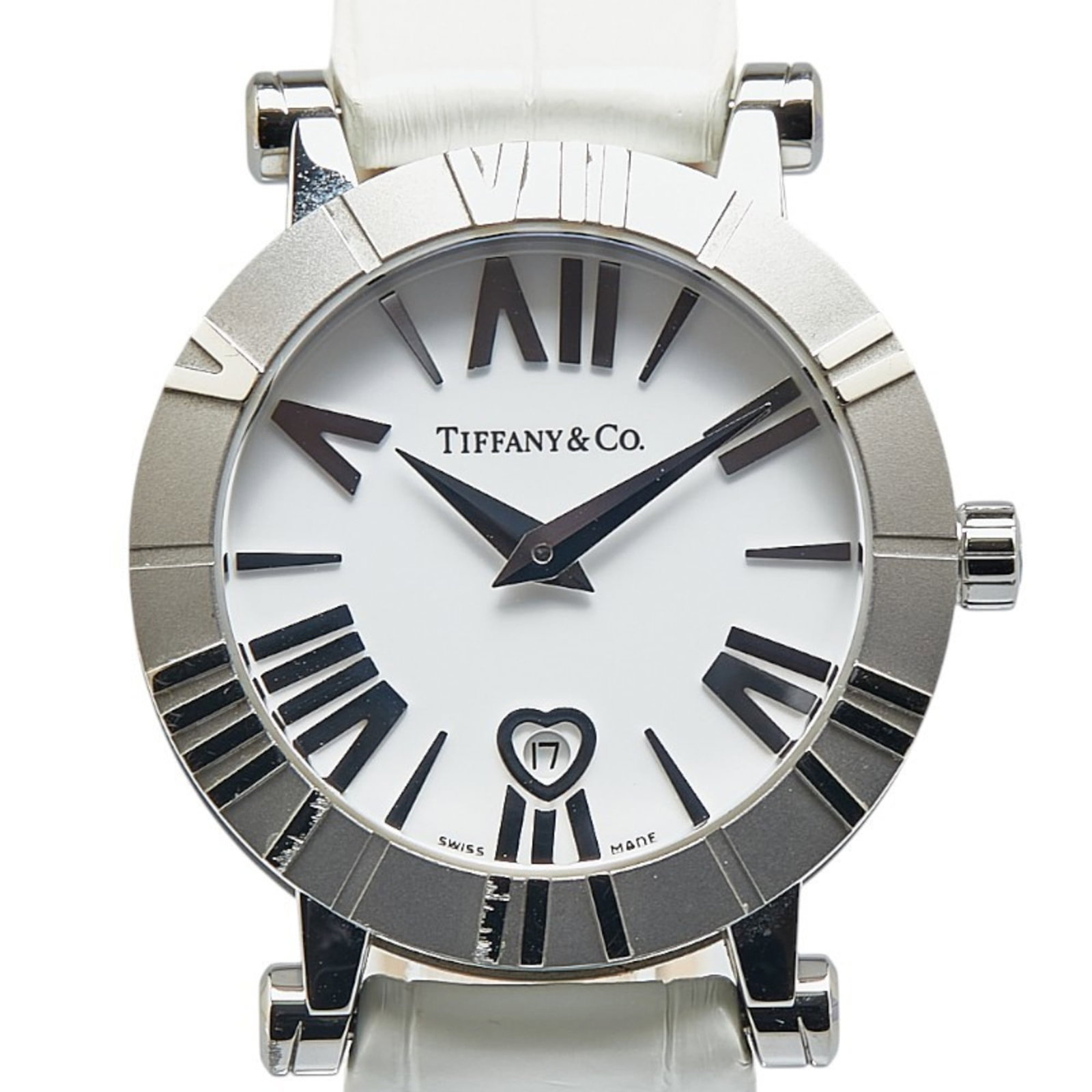 Tiffany Wristwatch: Tiffany Wristwatch Stainless steel case and band add a sleek touch to this white analog Tiffany wristwatch, featuring a quartz movement for accurate timekeeping. The compact design measures 29.7mm in