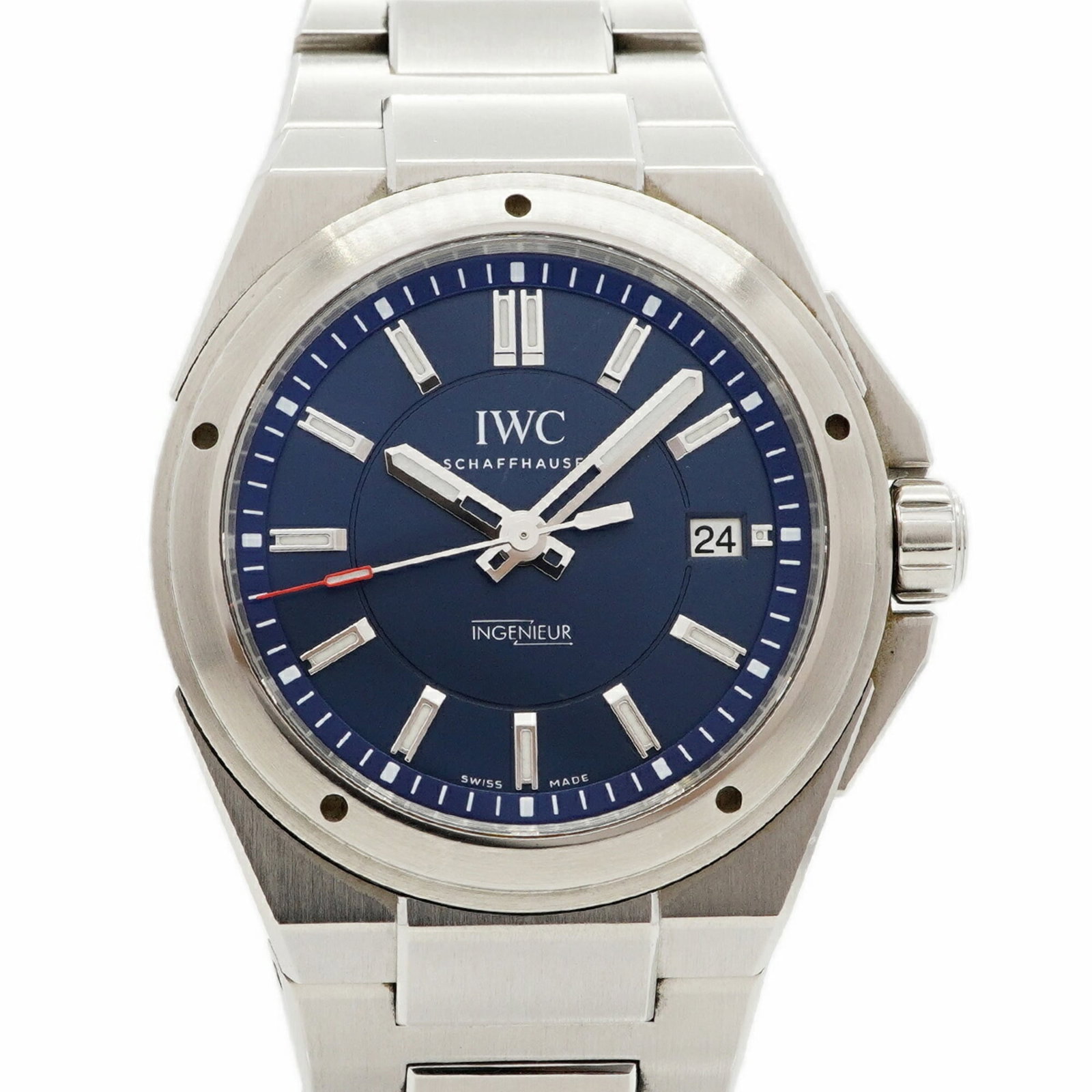 Wristwatch by Iwc: Wristwatch by Iwc Stainless steel band adds a touch of sophistication to this IWC wristwatch, featuring a self-winding automatic movement and a striking blue dial. The 38.9mm case diameter provides a