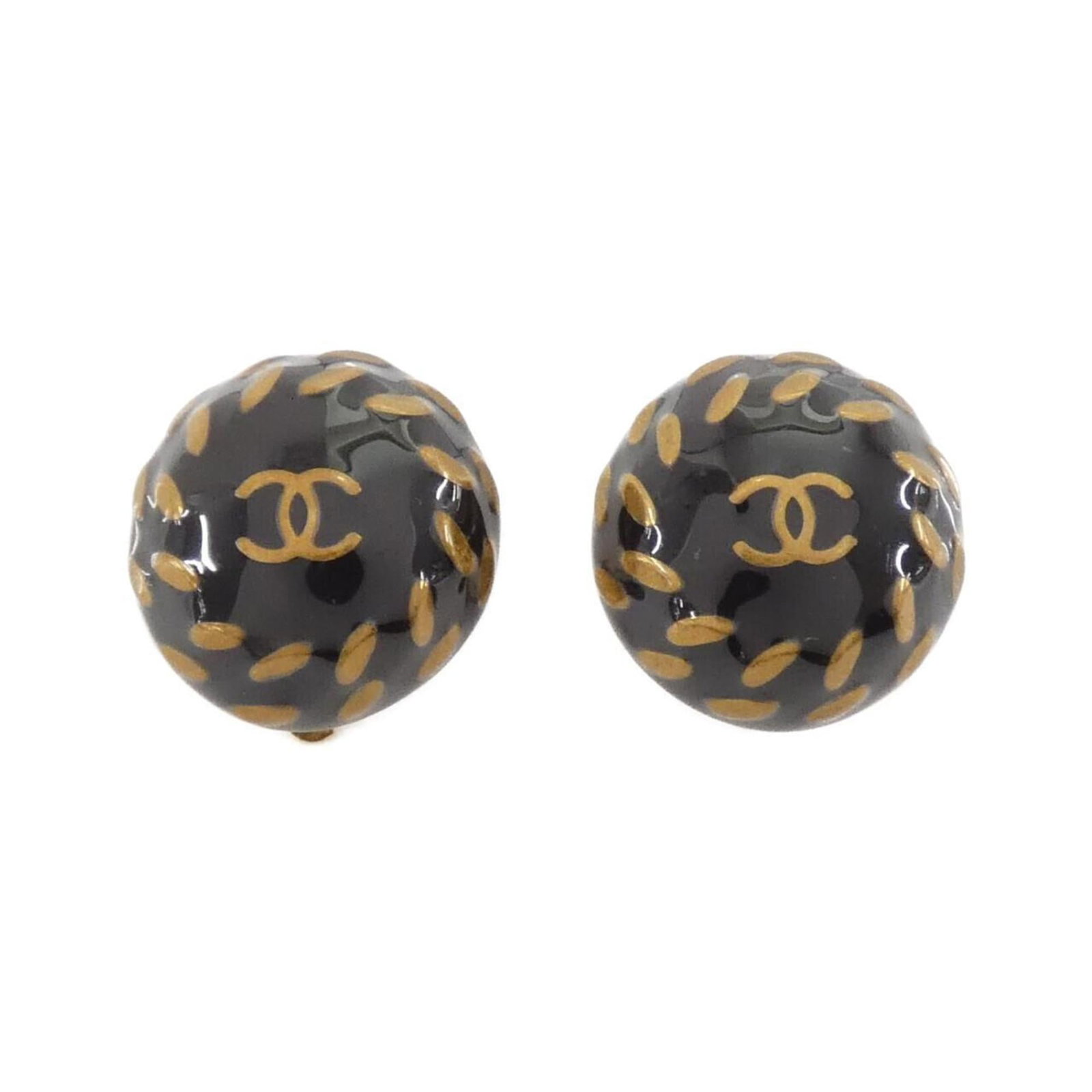Clip earrings by Chanel: Clip earrings by Chanel Clip earrings by Chanel, featuring a sleek black design with precise dimensions. Made to exacting standards, these earrings showcase the brand's attention to detail and