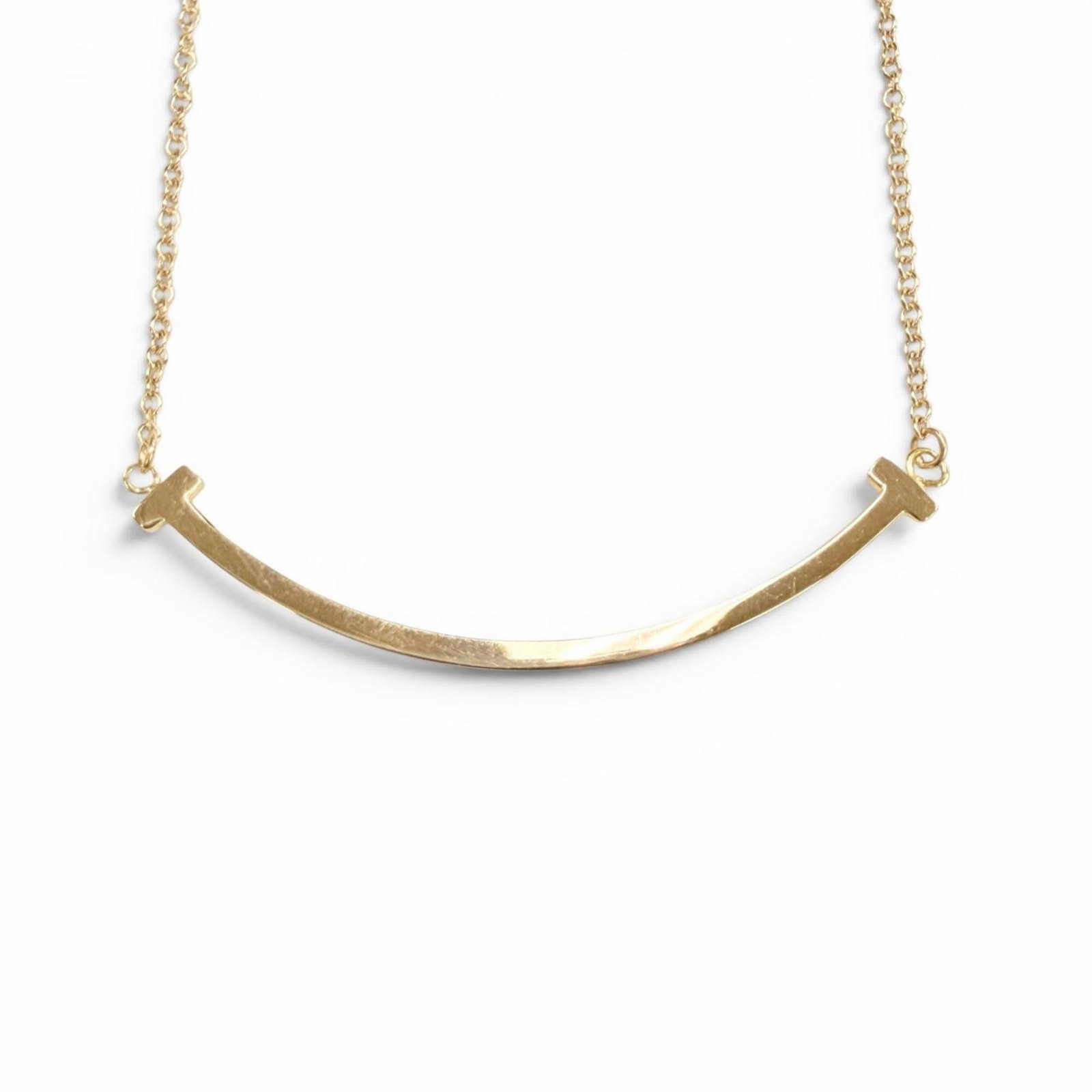 Tiffany&Co. Tiffany T Smile Small Pendant Necklace Pink Gold 18K With Box And Case Weight 2.67G: Tiffany&Co. Tiffany T Smile Small Pendant Necklace Pink Gold 18K With Box And Case Weight 2.67G Tiffany&Co. Tiffany T Smile Small Pendant Necklace in pink gold (18K) boasts a delicate design with a