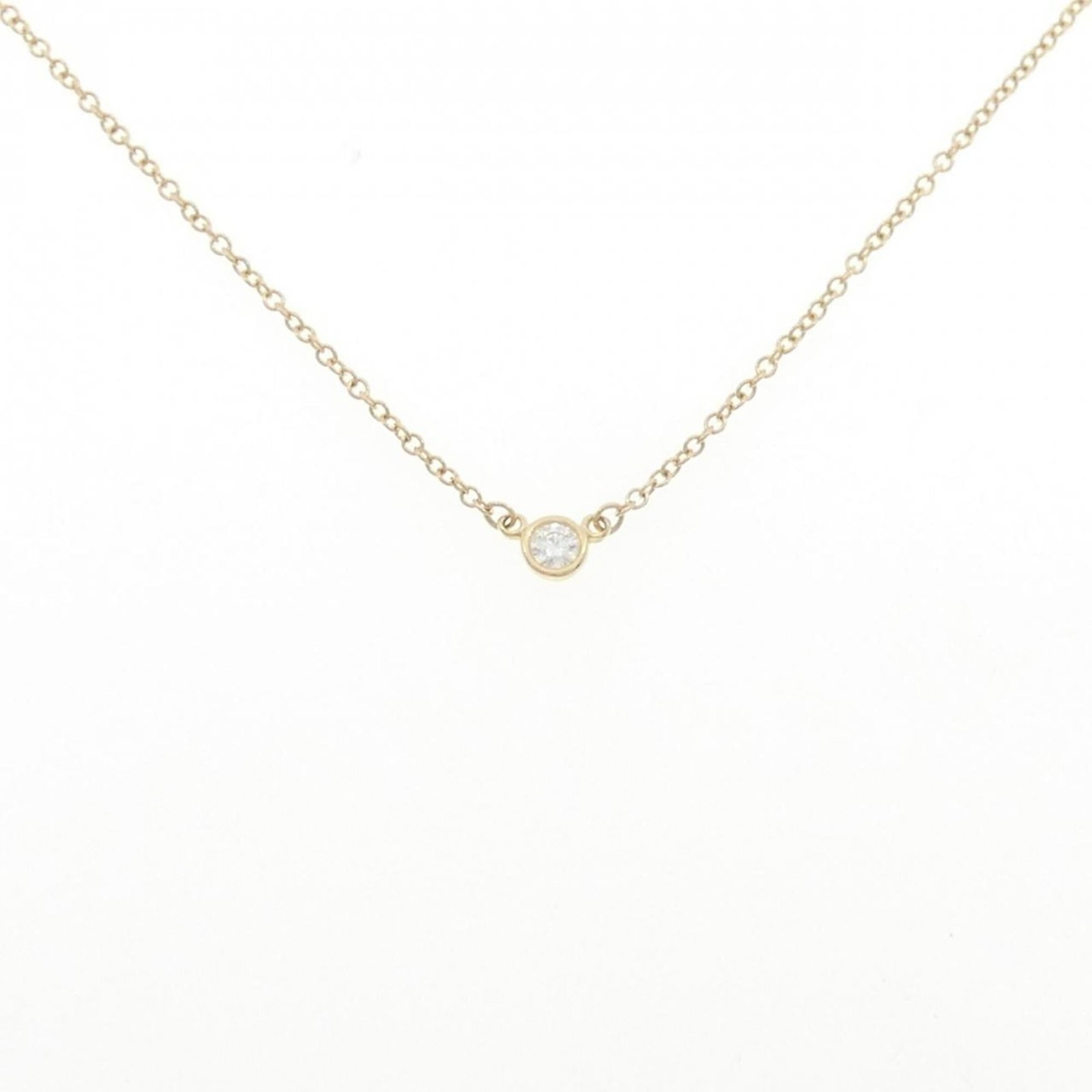 By Tiffany Yard Necklace: By Tiffany Yard Necklace Yellow gold (18K) Tiffany & Co. necklace features a diamond pendant, with a circumference of 41 cm / 16.14'' and a pendant size of 3.4mm / 0.13''. The necklace is crafted