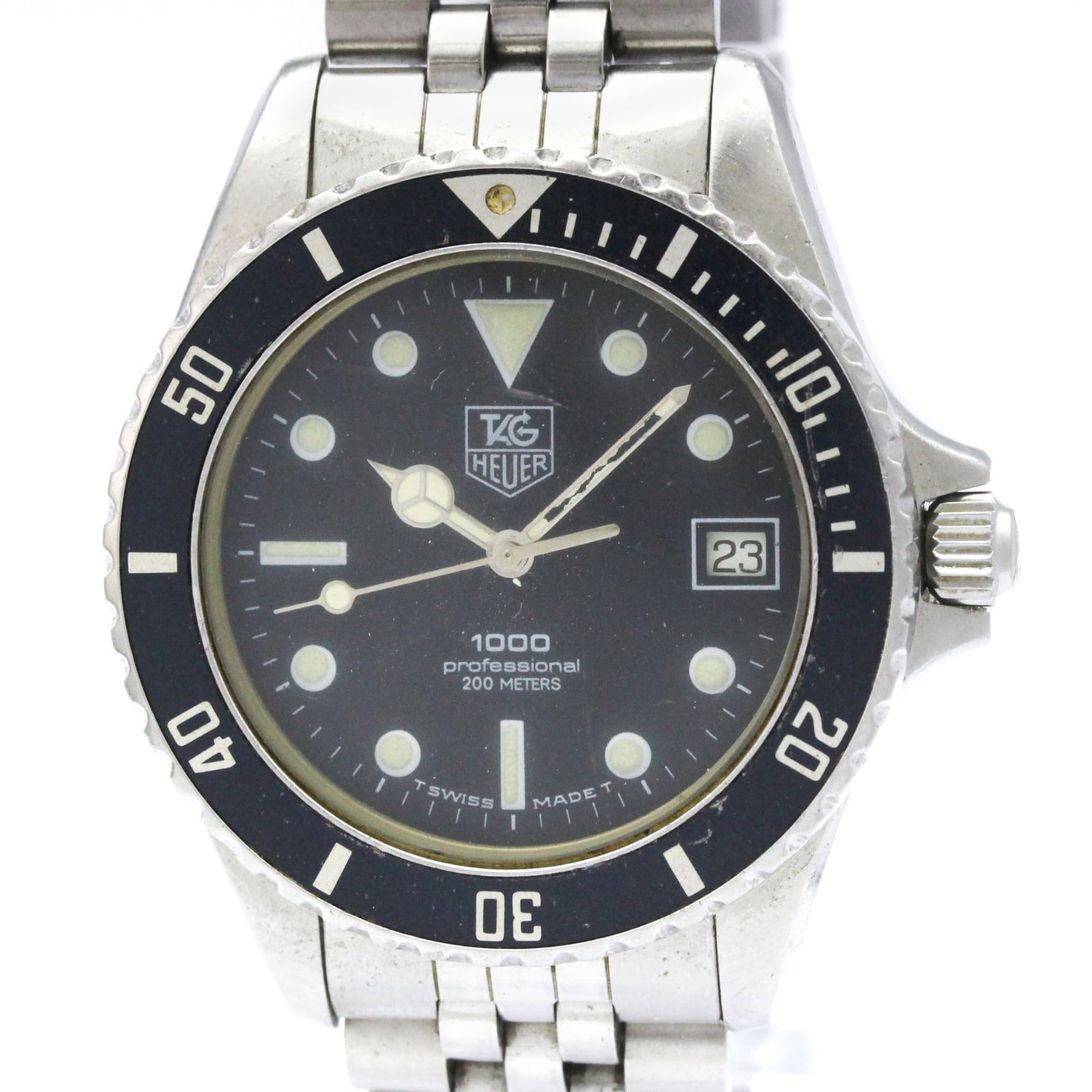 Wristwatch From Tag: Wristwatch From Tag Stainless steel case and band provide a rugged look, while the black dial adds a touch of sophistication. This Tag Heuer Professional quartz wristwatch features a date function