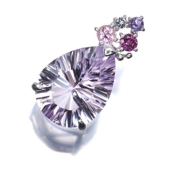 Amethyst 6.40Ct White Topaz Pink Tourmaline Teardrop Pendant 18K Wg: Amethyst 6.40Ct White Topaz Pink Tourmaline Teardrop Pendant 18K Wg 18k White Gold Teardrop Pendant Features Amethyst, White Topaz, and Pink Tourmaline. The natural amethyst centerpiece measures