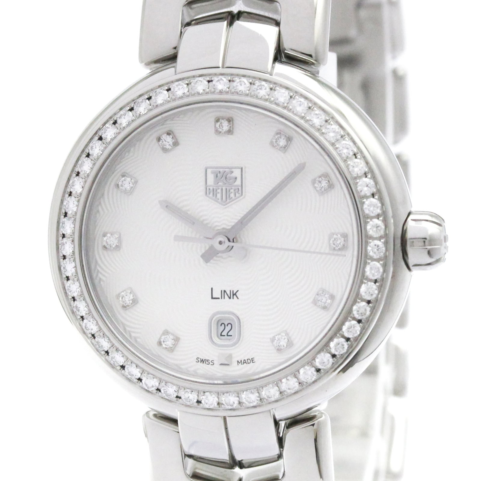 Wristwatch From Tag: Wristwatch From Tag Stainless steel case and band add a touch of sophistication to this elegant silver quartz wristwatch from Tag Heuer's Link collection. The sleek design features a date display,