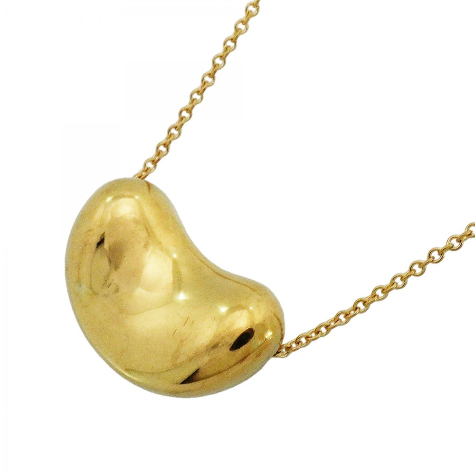 Tiffany and Co Bean Necklace 18k Yellow Gold Women's: Tiffany and Co Bean Necklace 18k Yellow Gold Women's 18k Yellow Gold Bean Necklace for Women - A delicate and elegant design, this Tiffany & Co. necklace features a 12mm x 18.7mm pendant suspended