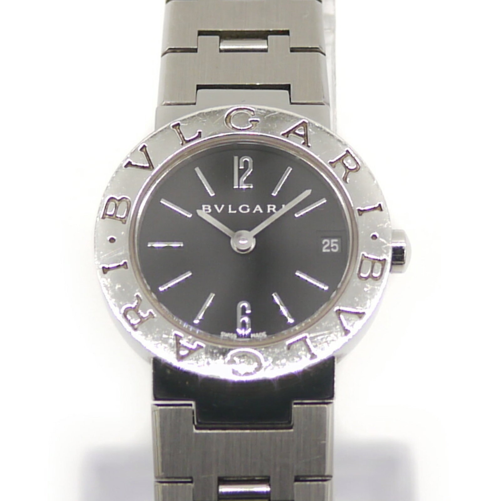Bvlgari Wristwatch: Bvlgari Wristwatch Stainless steel case and band add a sleek touch to this Bvlgari quartz wristwatch, featuring a black dial. With its compact size at 23mm, it's designed for women who appreciate