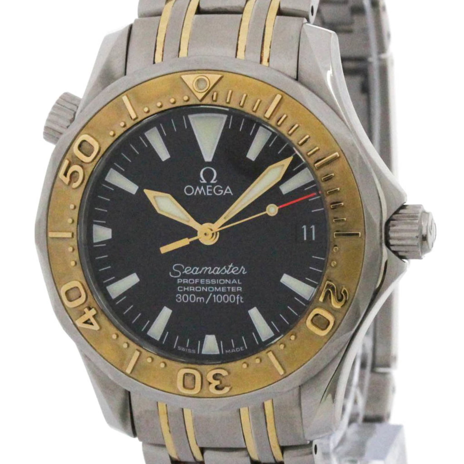 Wristwatch of Omega: Wristwatch of Omega Stainless steel and yellow gold (18K) construction provides a durable and luxurious feel. The self-winding automatic movement powers the watch, while the black dial offers a sleek