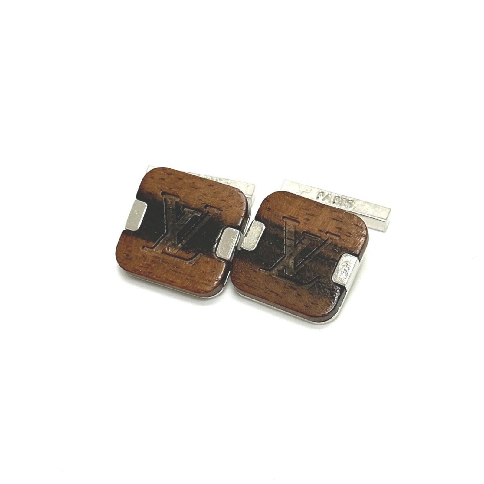 Stainless Steel Wood Cufflinks Louis Vuitton: Stainless Steel Wood Cufflinks Louis Vuitton Stainless steel and wood cufflinks with a classic Louis Vuitton design, featuring a timeless brown color. The durable stainless steel construction pairs pe