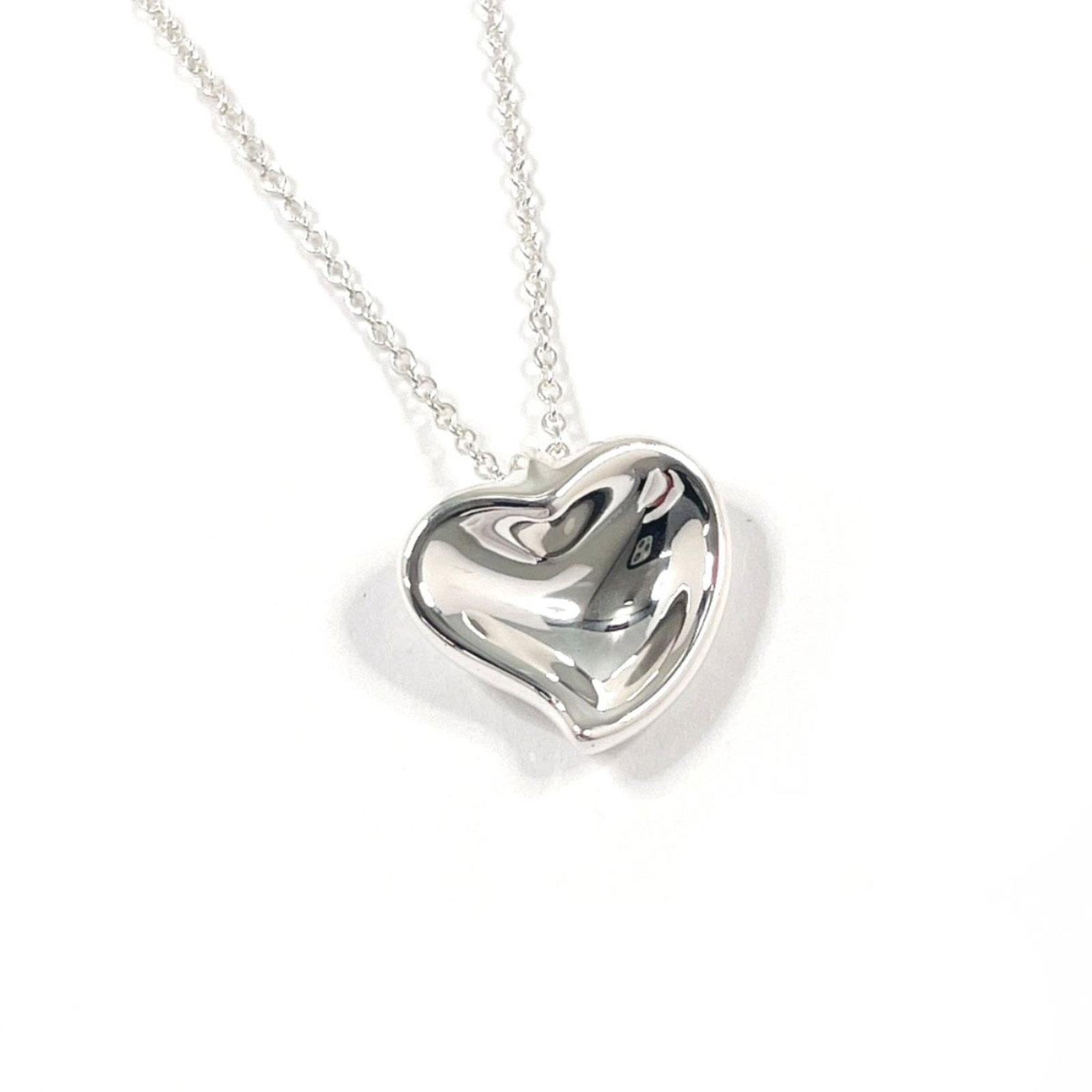Sterling Silver Curved Heart Elsa Peretti Tiffany Necklace Women's: Sterling Silver Curved Heart Elsa Peretti Tiffany Necklace Women's Sterling Silver Curved Heart Elsa Peretti Tiffany Necklace Women's - A beautiful, curved heart pendant in sterling silver, measuring