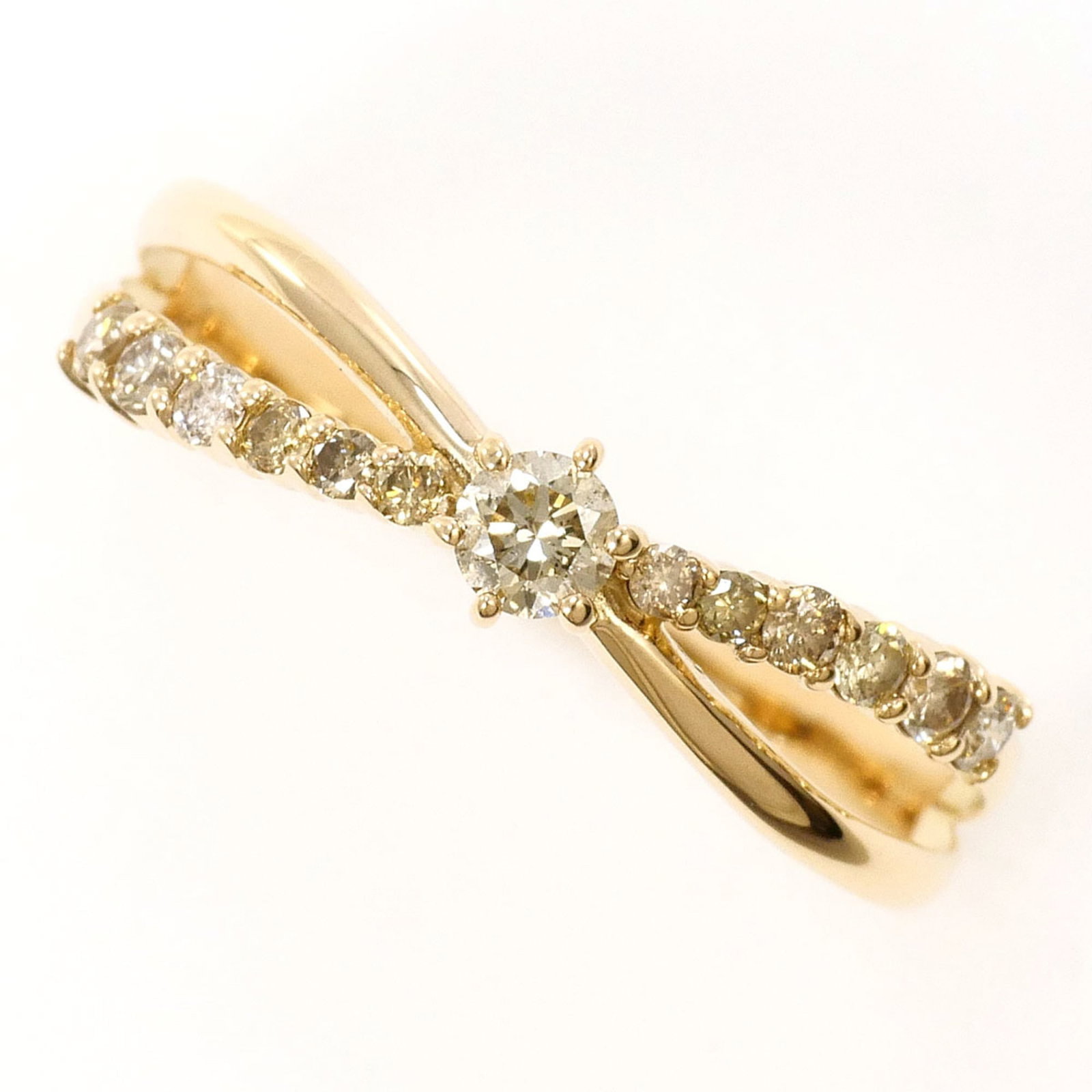 Unbranded band ring yellow gold 10K: Unbranded band ring yellow gold 10K Yellow gold band ring with a 0.20ct diamond, crafted from 10K metal, available in US size 6 and JP size 11. This elegant piece features a slender 4mm width and