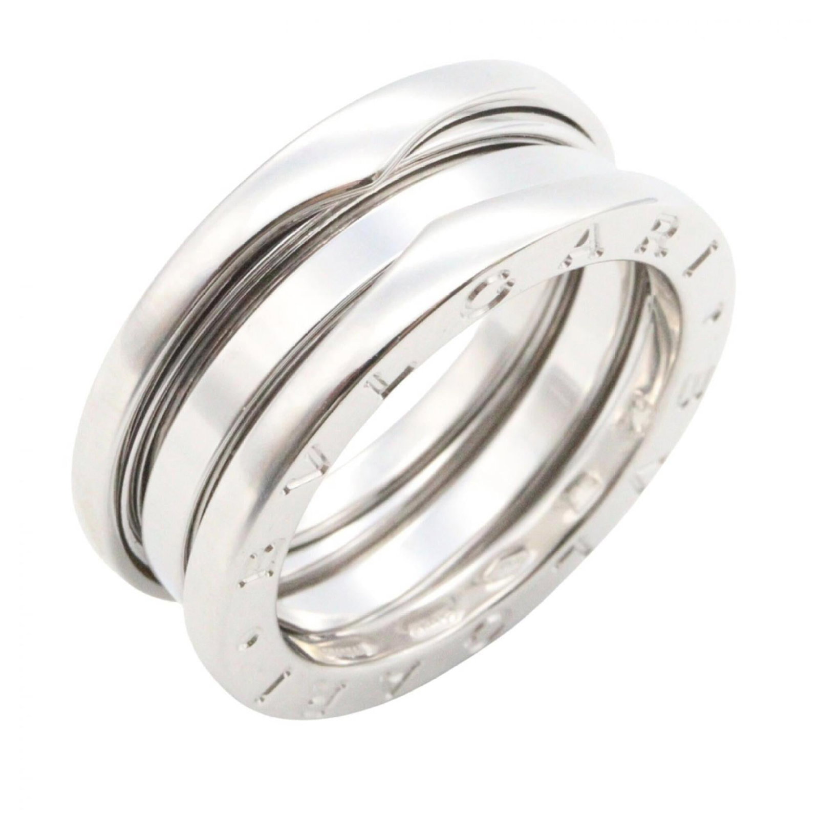 Bvlgari Band Ring White Gold (18K): Bvlgari Band Ring White Gold (18K) Bvlgari Band Ring White Gold (18K) features a sleek design with white gold material and 52 US size. This band ring is available in the brand's signature style,